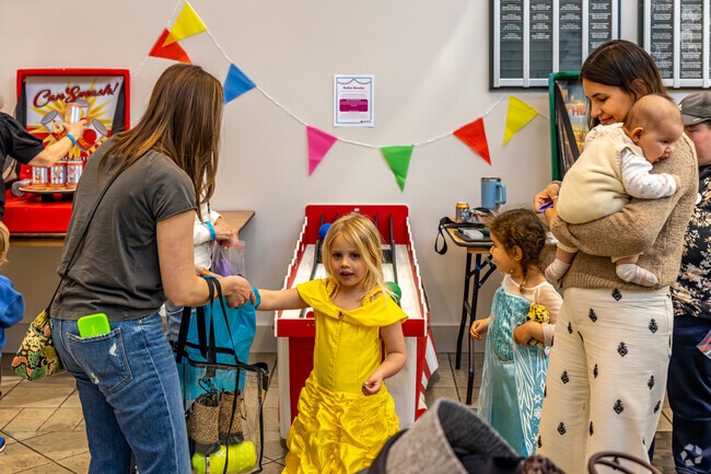 Children enjoy festive activities at the Long Beach Purim Celebration.