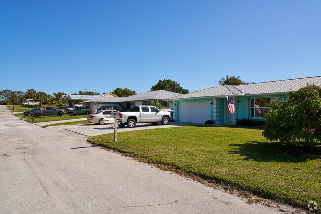 Many homes in the Rio neighborhood have metal roofs, making them more weather resistant.