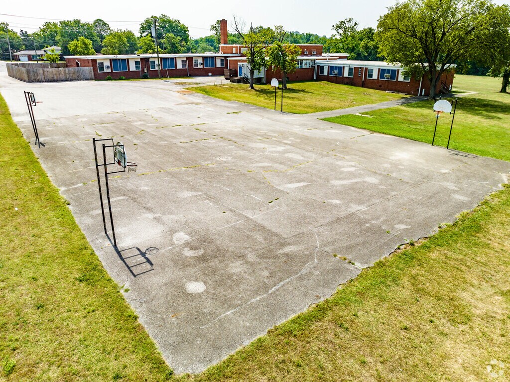 Learn to play basketball on the court at Neely's Bend Elementary School.