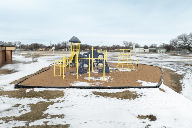 Kids can climb on the playground at Woodman Elementary School.
