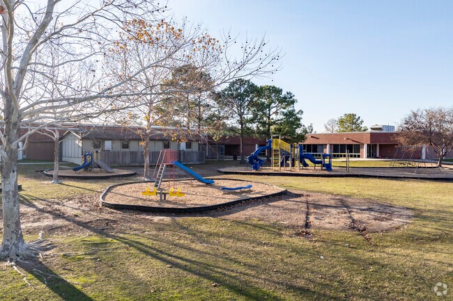 Kids can run and play on the large fields and playgrounds of Smith Elementary School.