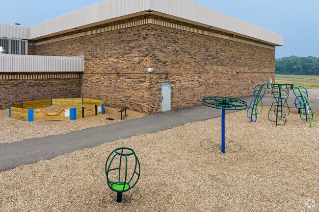 The playground equipment outside of Jefferson Middle School in Madison is used by students.
