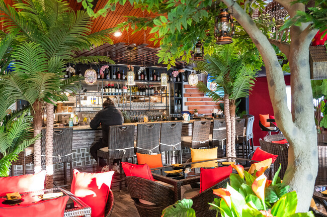 Grab a cocktail at the Monkey Lounge, located just down the road from Avon.