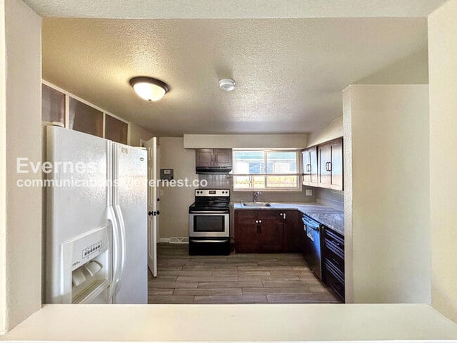 1345 Xanadu St, Aurora, CO 80011 - photo 2