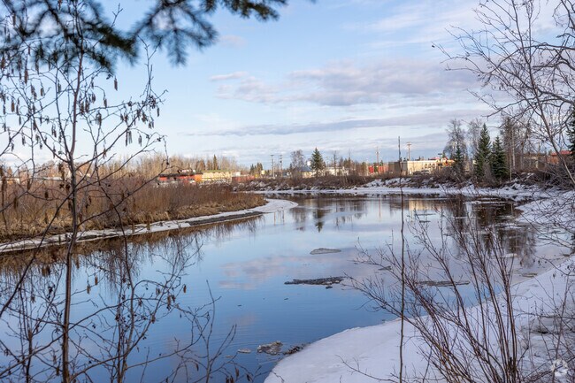 Early spring ice melts along the peaceful Chena River near College in Fairbanks.