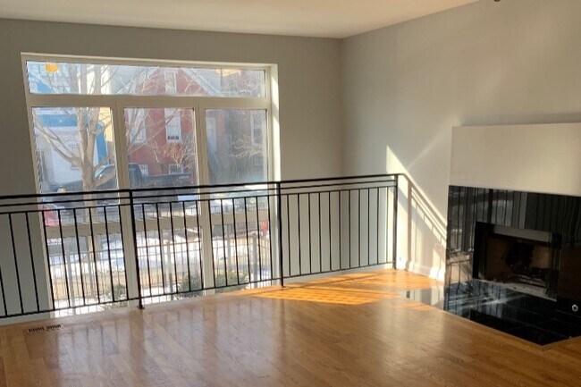 Upstairs living area w/ fireplace