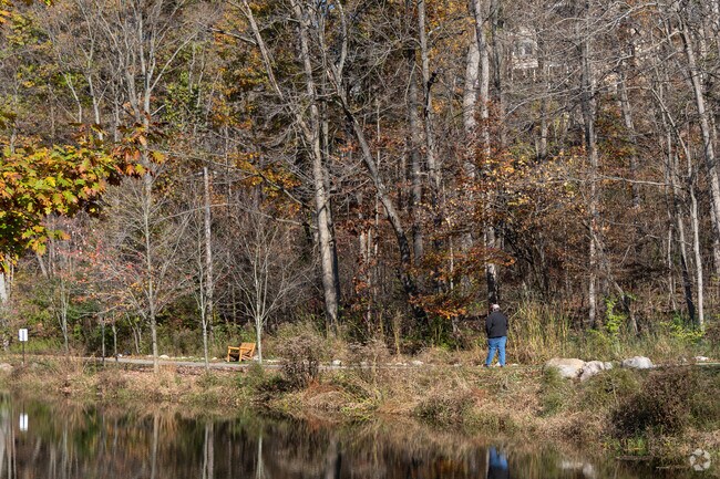 Oakwood residents often take peaceful midday walks along shaded pond trails in the neighborhood.
