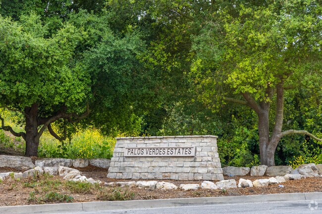 The stone monument welcomes visitors to Palos Verdes Estates.