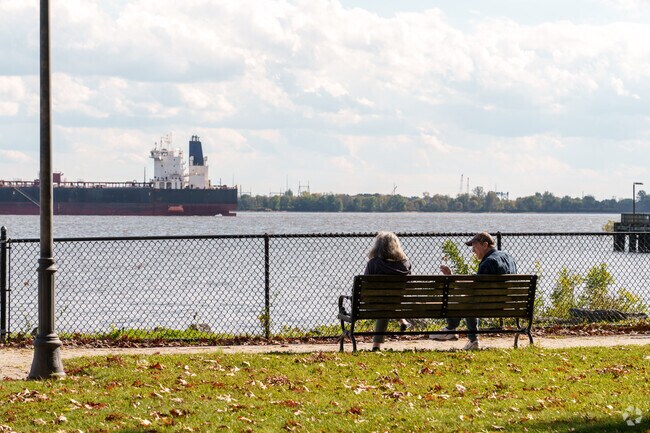 A park bench along the Delaware River is the perfect spot to relax in Marcus Hook.