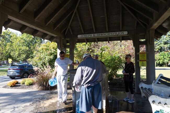 24/7 fresh spring water is running for locals to come and bring home at Saratoga Spa State Park.