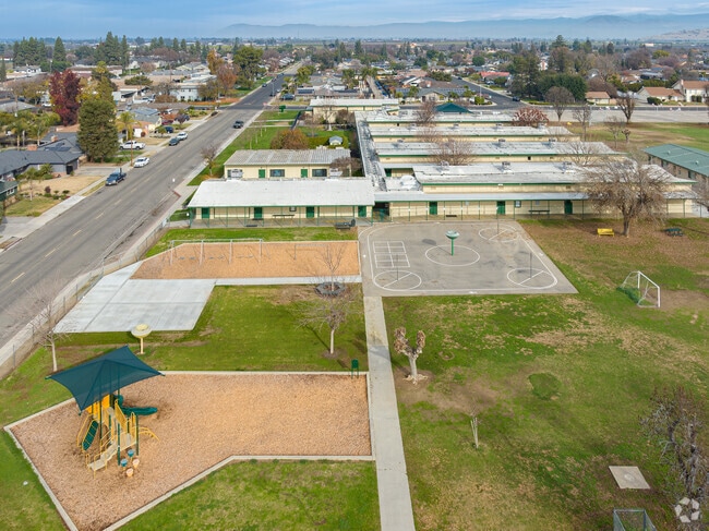 Students at Lincoln Elementary School enjoy large clean area to play during recess.