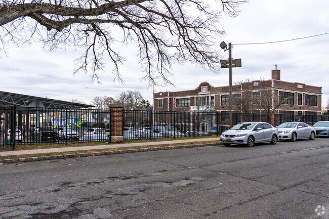 Belleville School No. 8 has a large solar panel providing shade to cars within the parking lot.