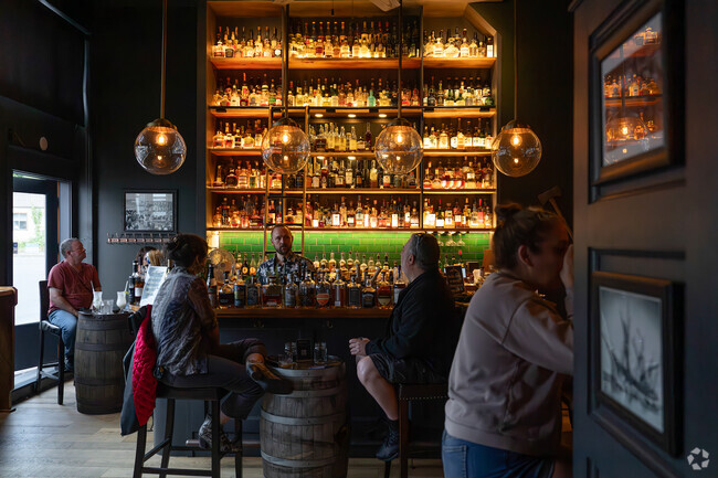Enjoy over 300 whiskies, shareable food boards, and craft cocktails at Blaylocks Whiskey Bar.