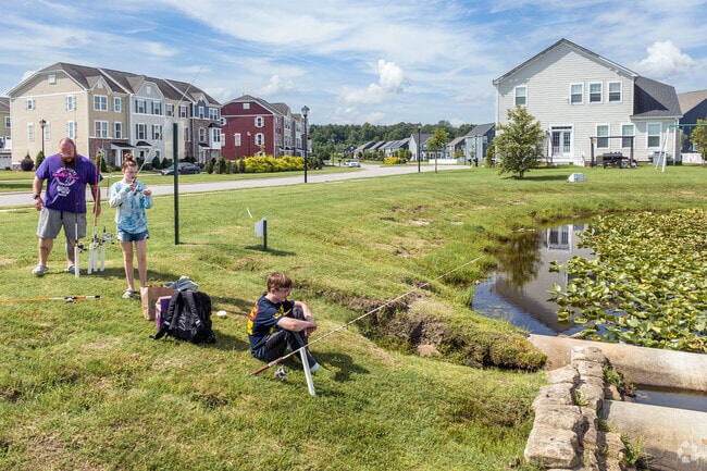 A family enjoying fishing in the Culpepper Landing neighborhood of Chesapeake, Virginia.