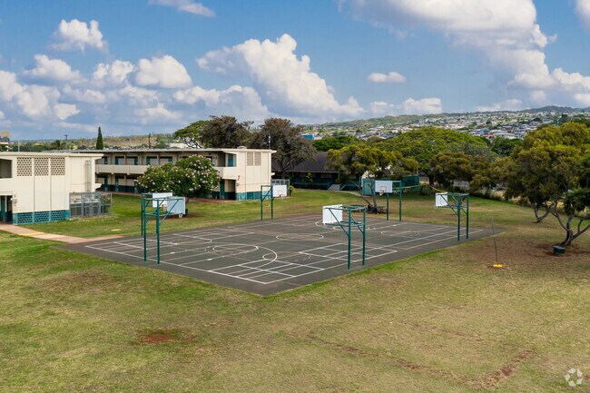 Students enjoy using the basketball court at Aiea Elementary School in Aiea, HI.