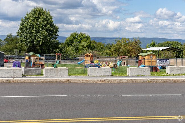 Kids play on the playground at Richland Academy.