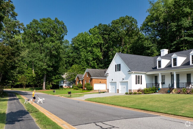 Ford’s Colony has 12 miles of paved trails that weave through the woods and neighborhoods for walks with pets or people.