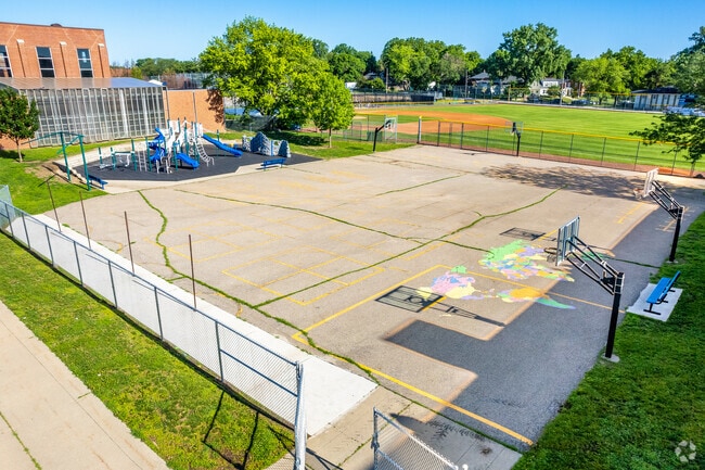 Students love the open play area at Hubbell Elementary School in Waveland Park.