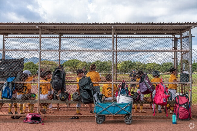 Youth sports, like baseball and soccer, are a common activity in Waimalu.