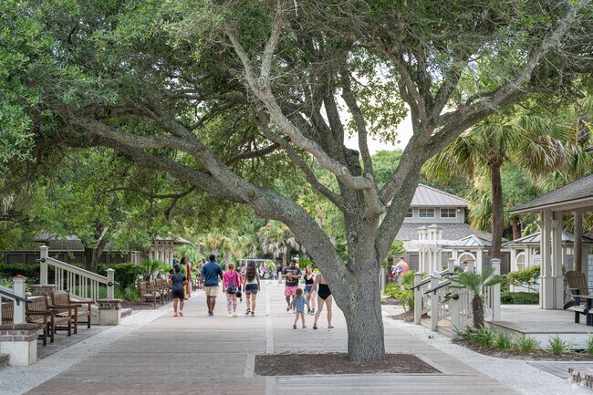 Large oak trees provide plenty of shade on the boardwalk at Coligny Beach Park.