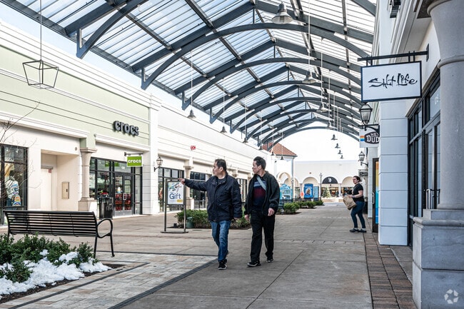 The locals of North Bay Shore enjoy a nice outdoor shopping experience at the Tanger Outlet.