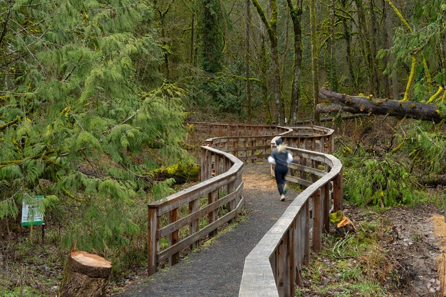 Enjoy the connecting trail through Arnold Creek Natural Area.