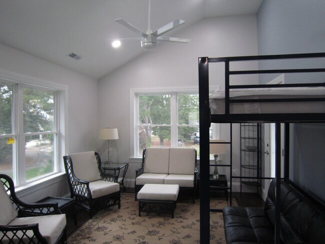 LR w/ cathedral ceiling and ceiling fan