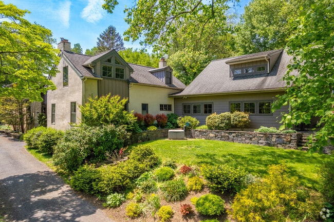 A unique home in Rose Valley with a luscious garden.