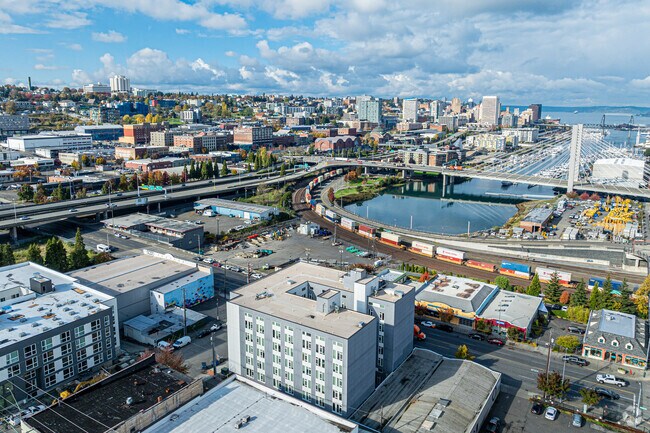 Downtown Tacoma is about roughly 25 miles south of Seatac.