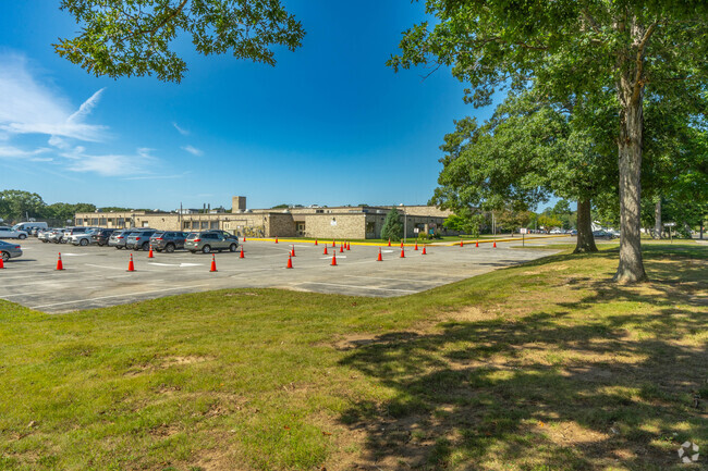 Parking and playground access at Robert Frost Middle School.