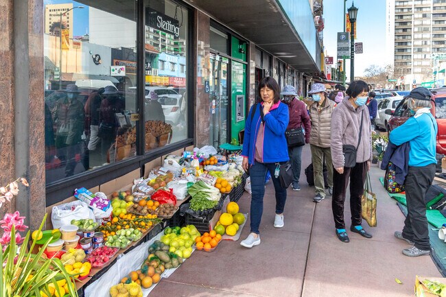 Community members help each other throughout the day in Chinatown.