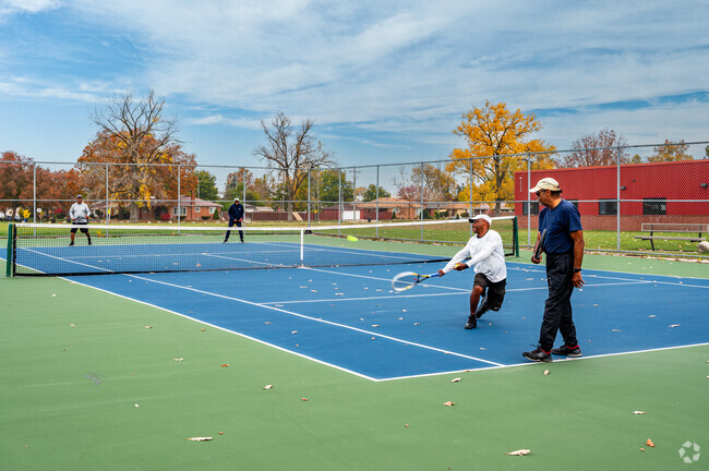 Enjoy a game of Tennis with friends at Comstock Park in Schaefer 7-8 Lodge.