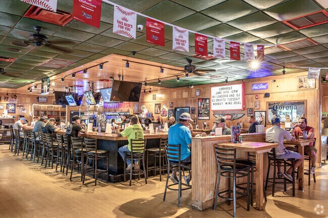 Game nights and comfort food are always on the menu at WingHouse Bar & Grill near Lexington Oaks.