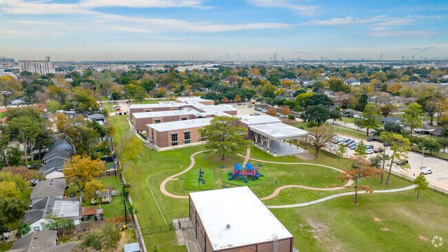 Housman Elementary's playground amenities promote physical activity and social interaction.