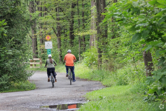 Bikers enjoy a ride protected from cars on the Kerhonkson Rail Trail.