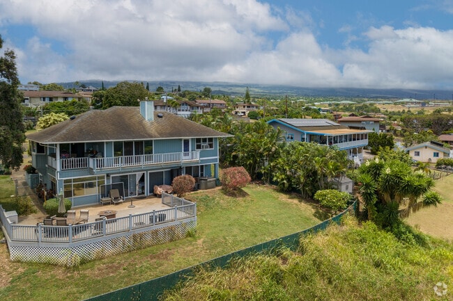 The wrap-around porches of these homes provide a perfect spot to enjoy the cool upcountry breeze