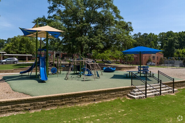 West Side Elementary School keeps their students shaded as they enjoy the playground.