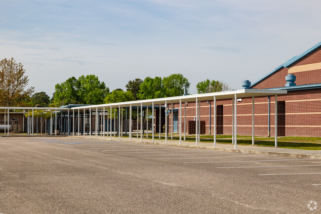 Berkeley Middle School in Moncks Corner has a nice covered pick up and drop off area.