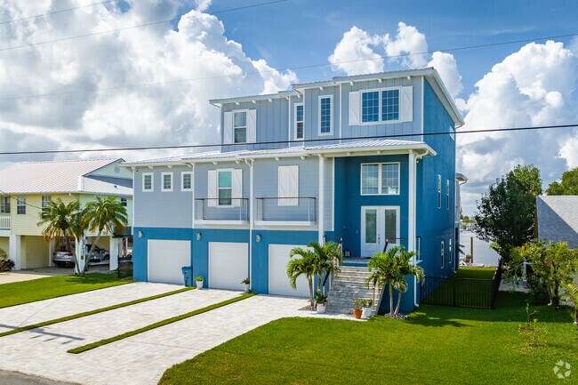 Typically homes in Hernando Beach have the garage on the ground floor with living space above.
