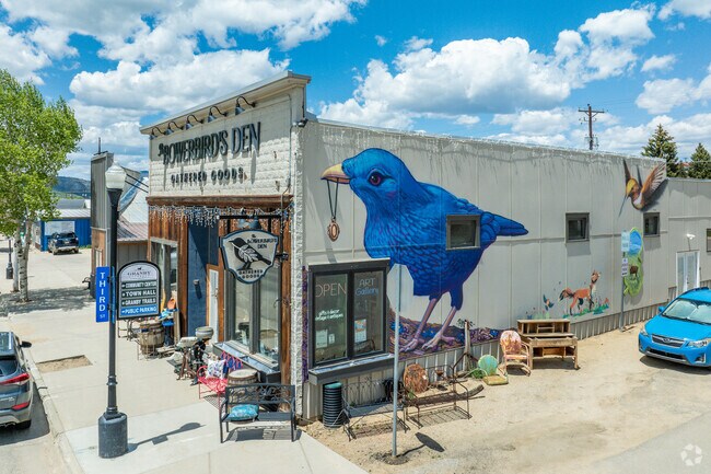 Many shops and restaurants feature beautiful local artwork and murals, such as this one at The Bowerbird's Den.