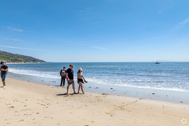 Walk along the clean, sandy beaches of Malibu near El Nido.