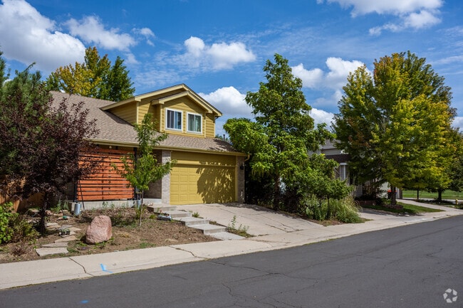 Colorful craftsman homes in Willow Run sit close to the street.