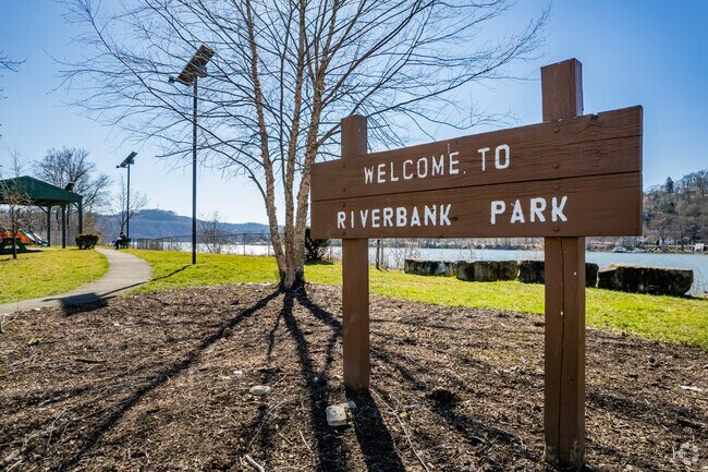 Riverbank Park sign welcomes Verona residents to its park.