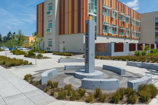 A monument on SE Powell Blvd anchors Kellogg Middle School in Portland.