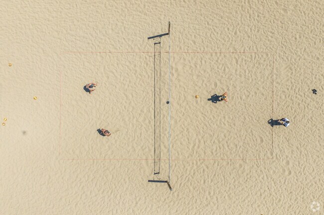 Locals enjoy playing beach volleyball at one of the many courts at Oxnard's beaches.