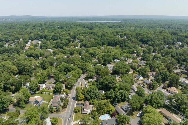 The neighborhood of Montvale is filled with green spaces and endless trees.