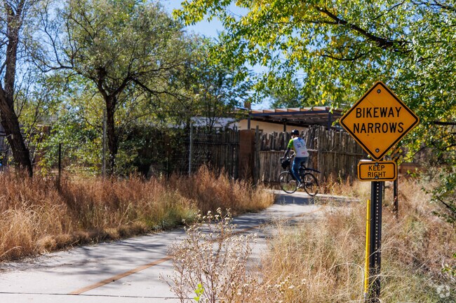Residents enjoy the bike trails winding through Casa Alegre.
