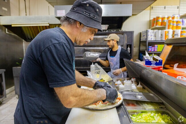 Maloney’s Pizzeria, Strathmore’s lone eatery, is known for generously topped pies.