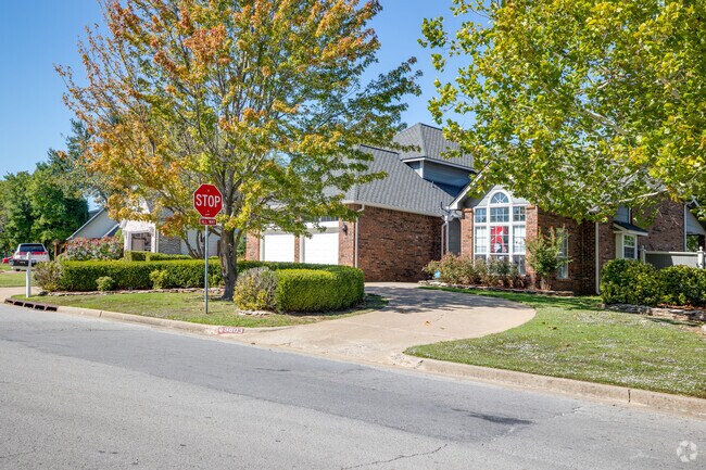 Homes in Woodlands have matures trees shading homes.