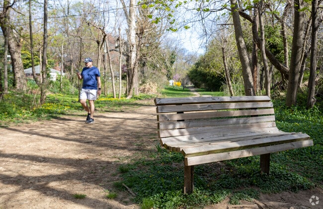 Peaceful walking paths in Stony Run Park provide Evergreen residents with a serene spot to enjoy nature.